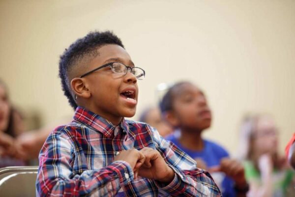 A Gleeksman-Kohn Children's Choir student rehearses at Germantown