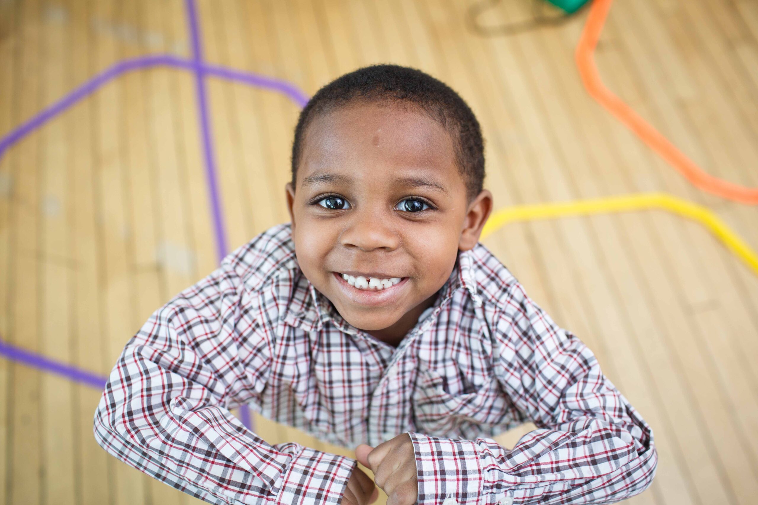 A smiling Kaleidoscope Plus student
