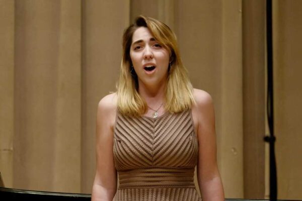 Settlement vocal student performs at an Annual Concert