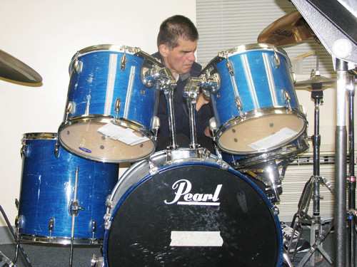 Arts therapy student practices the drums