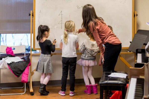 Music instruction at Settlement