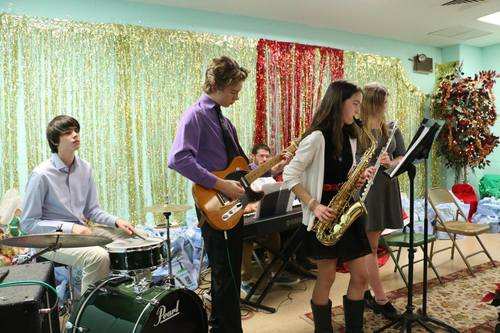 Jazz students perform at a community holiday event