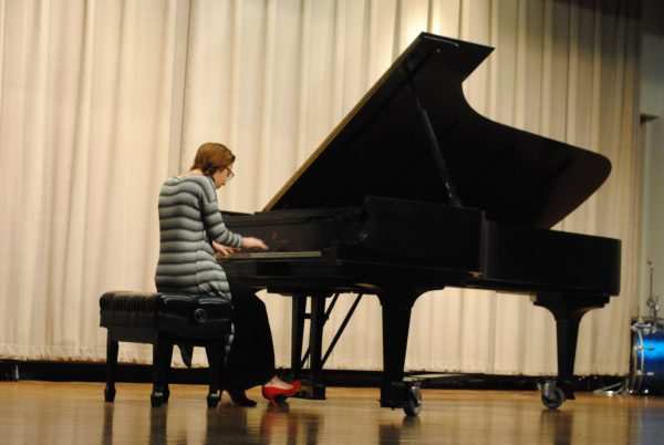 A Settlement Music School student performs at the Kardon-Northeast Branch