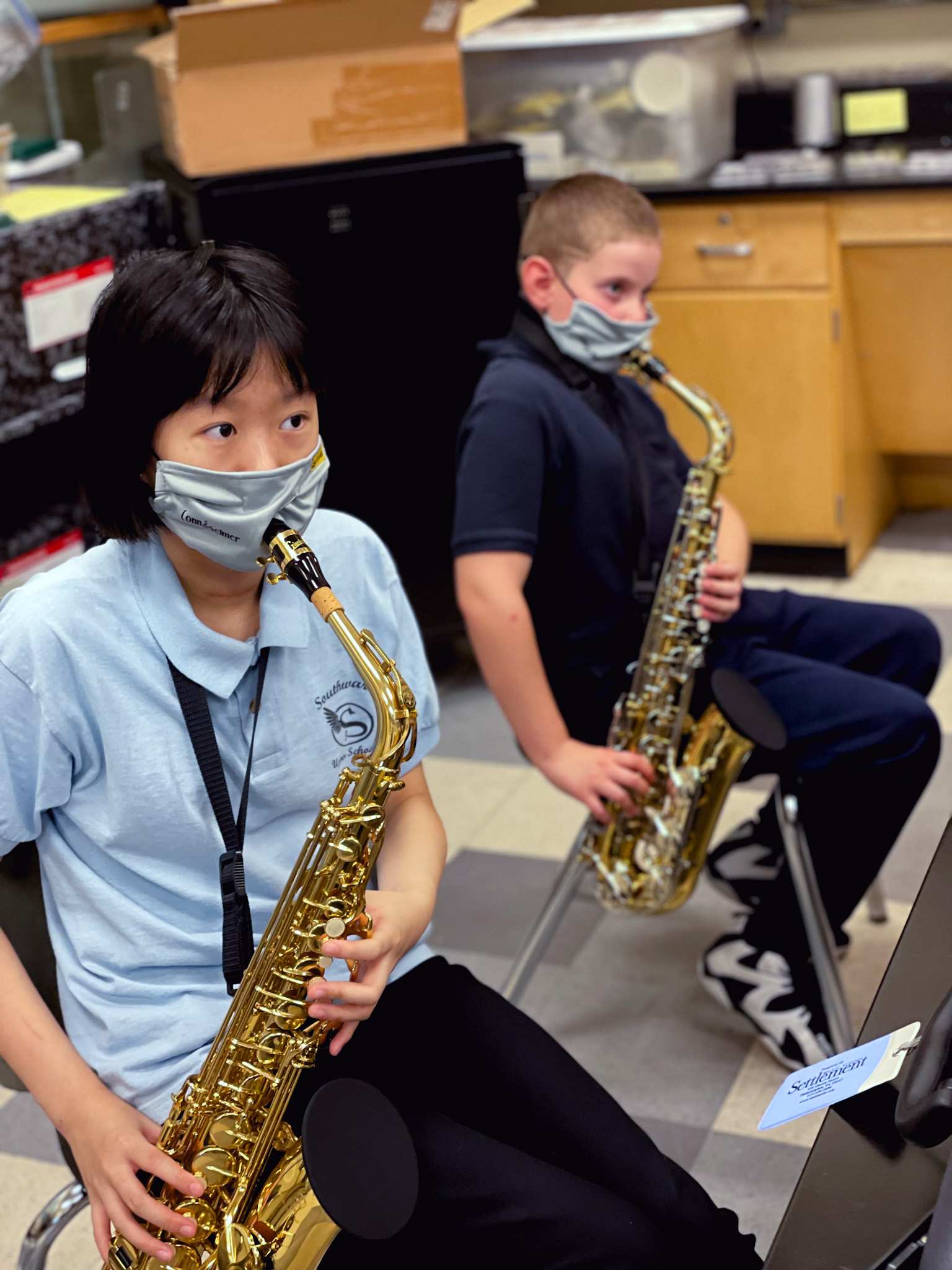 Two Music Education Pathways students playing alto saxophones.
